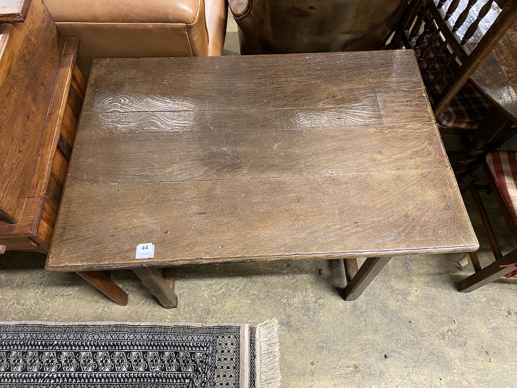 An 18th century rectangular oak side table, planked top, single frieze drawer, width 101cm, depth 68cm, height 72cm